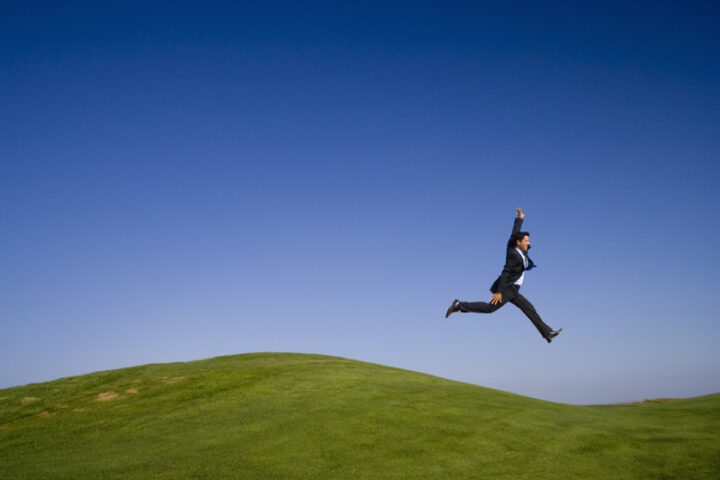 a giant step on a beautiful green and blue landscape